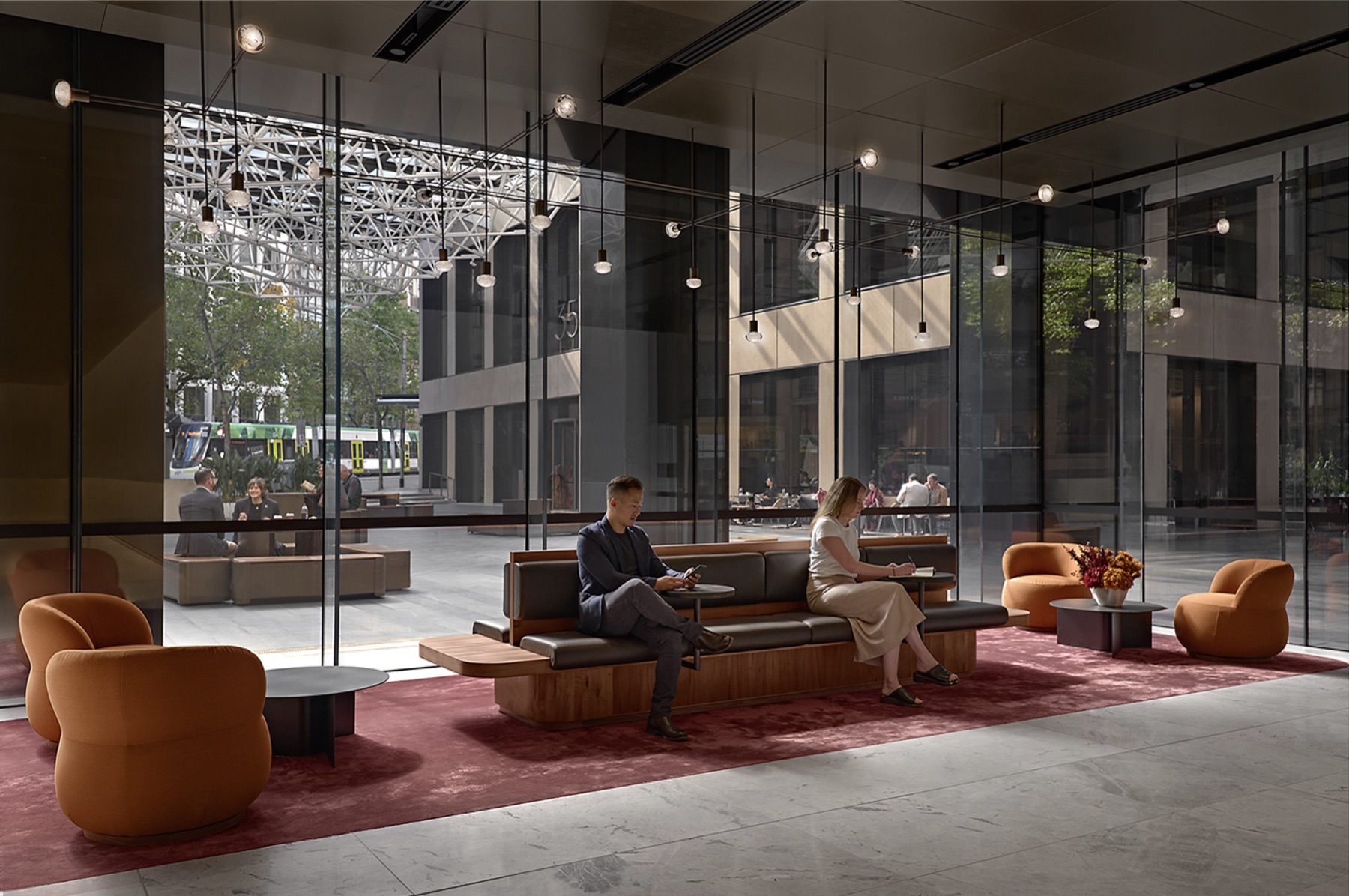Sculptural pendant lighting by Alex Earl in the foyer of 55 Collins Street, Melbourne, with Grimshaw